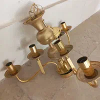 لوستر تمیز با آب طلا