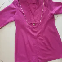 تعدادی لباس|لباس|تهران, فلسطین (میدان انقلاب)|دیوار