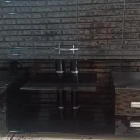 زیر تلویزیون شیشه ای