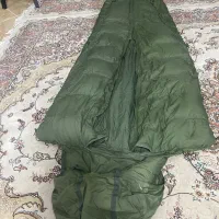 کیسه خواب پر و کفش کوه