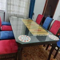 میز ناهار خوری ۸نفره در حد نو با روکش پارچه خارجی