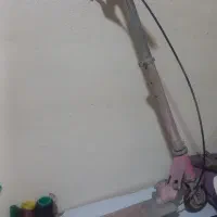 اسکوتر وتعدادی اسباب بازی ووسایل