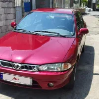 پروتون ویرا قرمز متالیک