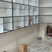 قفسه استند لوازم ارایشی