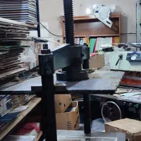 پرس صحافی و دستگاه گرد کن کتاب