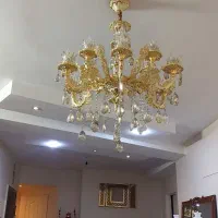 یک عدد لوستر طلایی ۱۲شاخه برنز