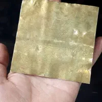 نوشته های دعا روی ورق برنجی