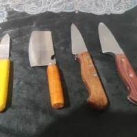 چاقو آشپزخانه همگی روی همدیگه باقناری