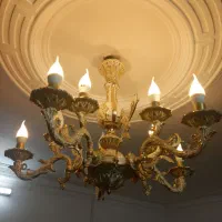 لوستر برنز و ساعت طرح برنز