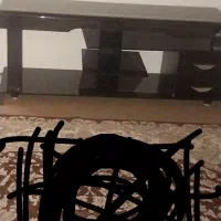 ی میز تلویزیون  شیشه  ای تمیز بدون خط