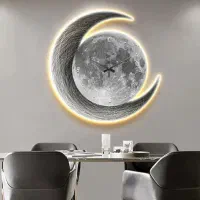 ساعت دیواری و تابلو طرح ماه و خورشید