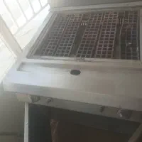 دستگاه گریل سنگی همبرگر کار کرده