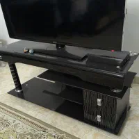 میز تلویزیون فلزی شیشه‌ای