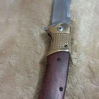 چاقو کلکسیونی|کلکسیون اشیاء عتیقه|ری, شهادت|دیوار