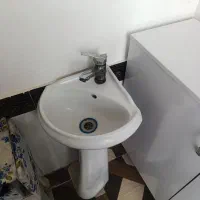 روشویی دستشویی همراه با شیر تکمیل