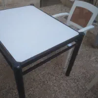 میز آهنی و دو صندلی