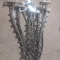 قفسه فلزی مشبک۳۲تا،تعدادی رگال تیله ای با چوب کار|کتابخانه، شلف، قفسههای دیواری|اندیشه, شهرک کوثر|دیوار