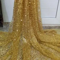 چند قواره پارچه و لباس کردی