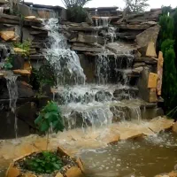 ساخت ابشار طبیعی و ایجاد فضای سبز و چمنکاری