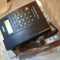 تلفن رومیزی تیپتل و ساعت رومیزی بزرگ و کوچک