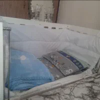 تخت کودک کنار مادر کاملا سالم
