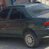 پژو۲۰۰۰کاربراتی مدل۷۹ دورنگ رنگ یشمی متالیک