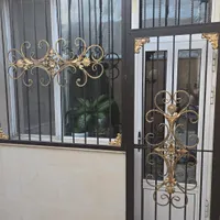 نرده پشت پنجره ترکیبی از چدن وکنگره|مصالح و تجهیزات ساختمان|کرمانشاه, |دیوار