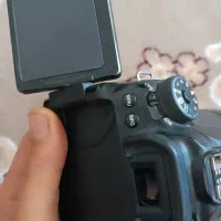 دوربین کانن در حد با لنز 18*135