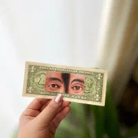 نقاشی چشم های پارتنرتون روی دلار