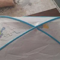 پشه بند نوزاد.