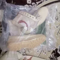یک دست لباس مرزبانی ویک جفت پوتین سایز 42
