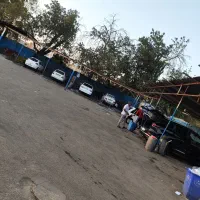 کارگر کارواش با جای خواب