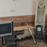 میز‌تلوزیون با اگزوز فروشی و ساعت همه‌فروشی
