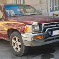 تویتا وانت هایلوکس دو کابین رنگ قرمز