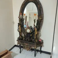 کنسول آیینه شمعدان و ساعت.