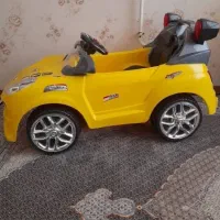 ماشین شارژی زرد