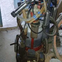 شیردوش گاوی دو واحده و کره گیر