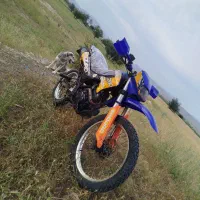 تریل 250cc|موتورسیکلت|کنار تخته و کمار, |دیوار