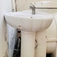 روشویی سفید مدل صدفی به همراه شیر آب