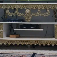 بوفه و ساعت ایستاده و میز تلویزیون