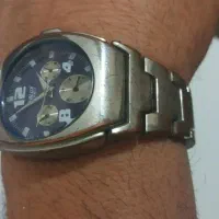 یک ساعت قدیمی ژاپنی و یک ل ن ت