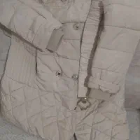 یک عدد کاپشن بارانی زنانه