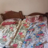 تخت دو طبقه همراه دو کشو بزرگ در طبقه پایین