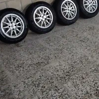 رینگ یازده پر و لاستیک 205 پژو و سمند در حد نو|قطعات یدکی و لوازم جانبی|مسجد سلیمان, |دیوار