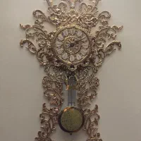 ساعت پاندول دار آب طلا