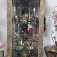 بوفه برنجی باسعادت زیادی وسایل دکوری برنجی