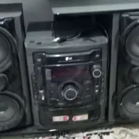 تلویزیون میز تلویزیون و یک ضبط با دو باند|میز تلویزیون|تربتحیدریه, مظفریه|دیوار