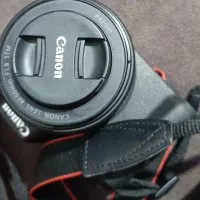 کنون r50 همراه دولنز درحد آکبند