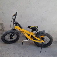 دوچرخه سایز ۱۶ قناری با وسایل ایمنی و چرخ کمکی