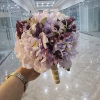 دسته گل و حلقه گل مصنوعی